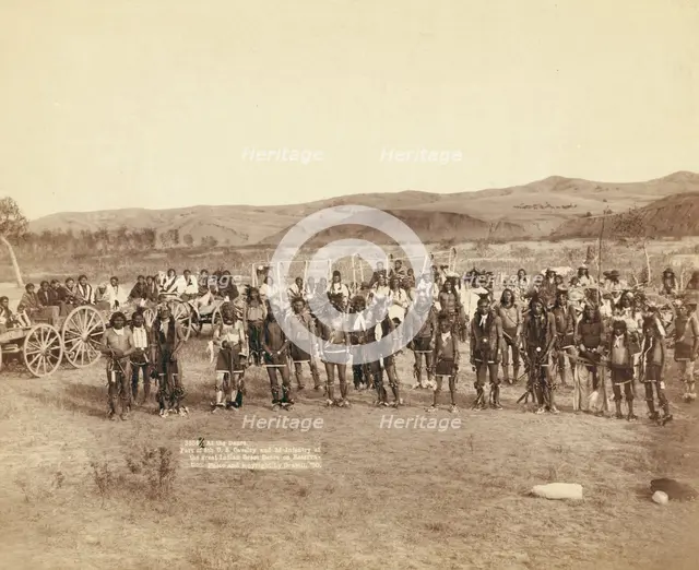 At the dance Part of the 8th US Cavalry and 3rd Infantry at the great Indian grass dance..., 1890. Creator: John C. H. Grabill.