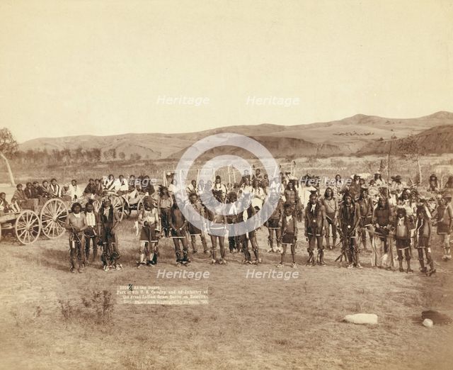 At the dance Part of the 8th US Cavalry and 3rd Infantry at the great Indian grass dance..., 1890. Creator: John C. H. Grabill.