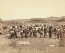 At the dance Part of the 8th US Cavalry and 3rd Infantry at the great Indian grass dance..., 1890. Creator: John C. H. Grabill