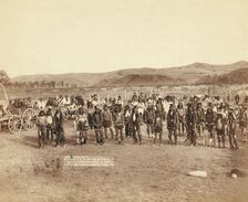 At the dance Part of the 8th US Cavalry and 3rd Infantry at the great Indian grass dance..., 1890. Creator: John C. H. Grabill