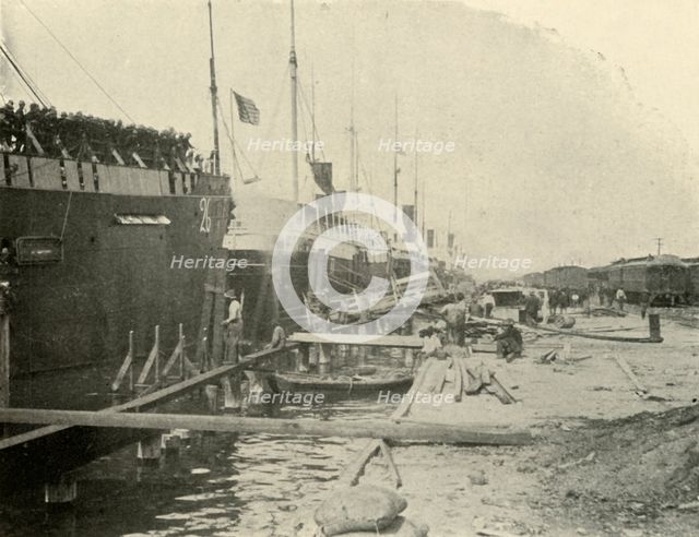 'At the Dock, June 10th', Spanish-American War, 1898, (1899). Creator: Burr McIntosh.