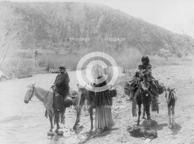 At the ford, c1903. Creator: Edward Sheriff Curtis.