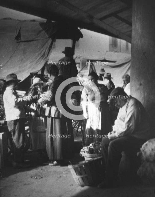 At the French market, New Orleans, between 1920 and 1926. Creator: Arnold Genthe.
