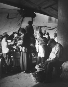 At the French market, New Orleans, between 1920 and 1926. Creator: Arnold Genthe