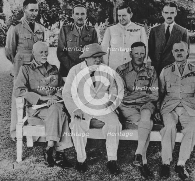 'At the Front in Egypt: Mr. Churchill in Cairo with members of the Middle East War Council', 1942. Artist: Unknown.