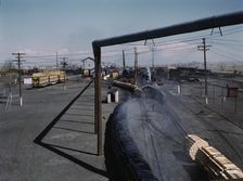 At the Santa Fe R.R. tie plant, Albuquerque, New Mexico, 1943. Creator: Jack Delano