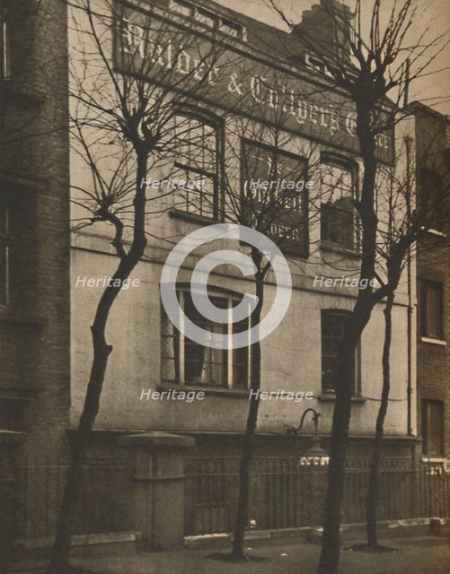 'At the Sign of the Old Bell in St. Bride's Churchyard', c1935. Creator: Walter Benington.