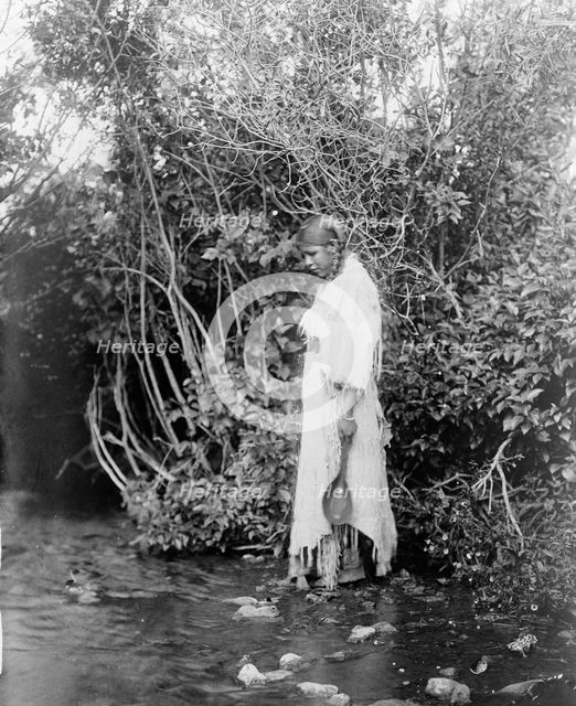 At the water's edge-Arikara, c1908. Creator: Edward Sheriff Curtis.