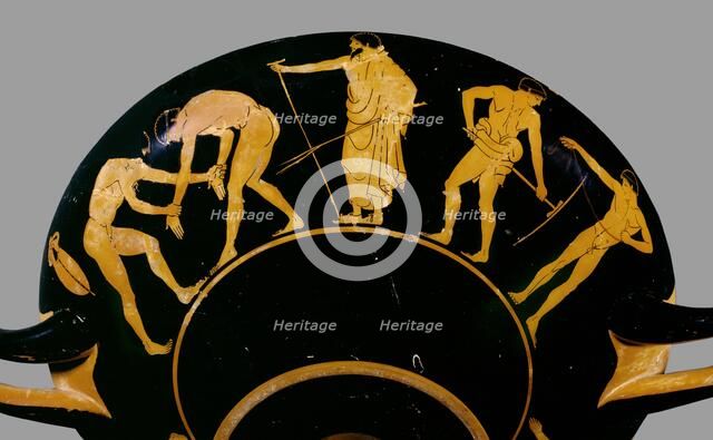 Attic red-figure cup depicting trainer with wrestlers and other athletes, 480 BC. Artist: Antiphon Painter.