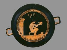 Attic red-figure cup depiting a seated helmet maker and his equipment, c480 BC. Artist: Antiphon Painter