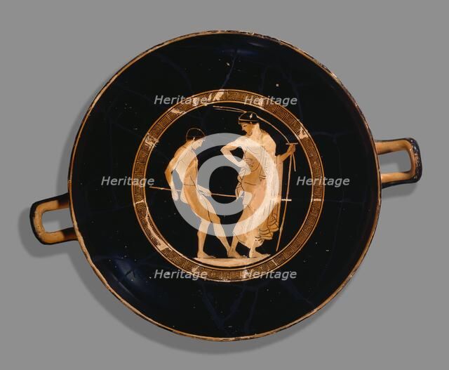 Attic red-figure cup of boy athlete and trainer, 480 BC. Artist: Antiphon Painter.