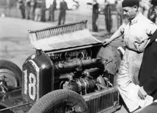 Attilio Marinoni, chief mechanic of Scuderia Ferrari, with an Alfa Romeo, 1934