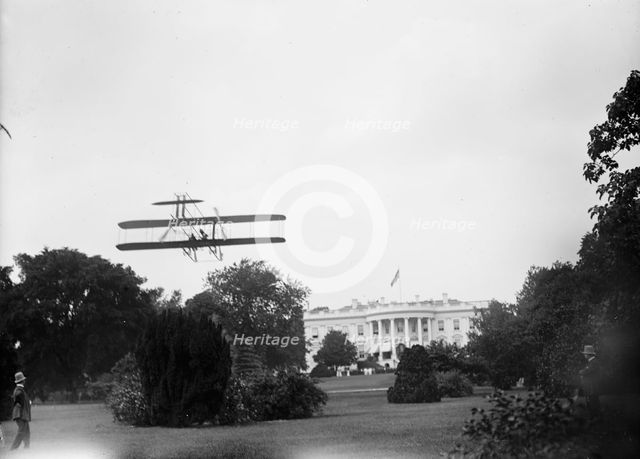 Atwood, Harry. Aviator. Rising From White House Lawn In Wright Type B Plane, July, 1911. Creator: Harris & Ewing.
