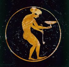 Athenian red-figure cup with naked girl with cup and ladle inside, 520 BC. Artist: Oltos