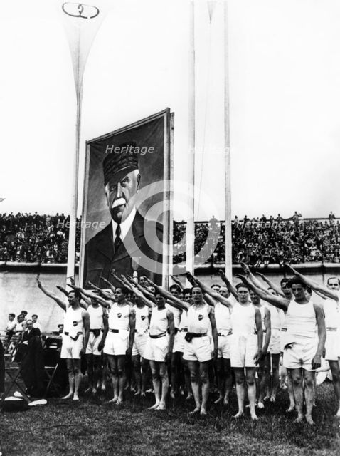Athletes giving the fascist salute, Parc des Princes, Paris, 1941. Artist: Unknown