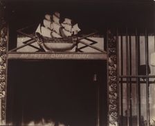 Au Petit Dunkerque, 3 quai Conti, 1900. Creator: Eugene Atget