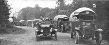 Au Volant; convoi d'autos-camions menes par des conducteurs indo-chinois, sous..., 1918. Creator: Unknown