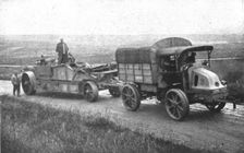 Au Volant; Tracteurs d'une piece de 240: voiture-affut et voiture-piece 1918. Creator: Unknown