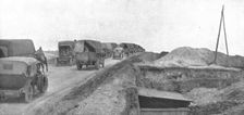 Au Volant; Une route du front: arrivee des convois dans la zone avancee 1918. Creator: Unknown