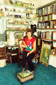 Author Sarah Fabian Baddiel at home with some of her collection of golf memorabilia Creator: Unknown