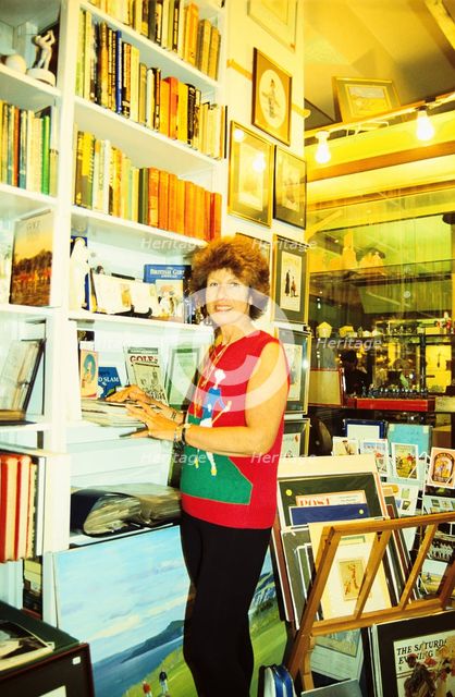 Author Sarah Fabian Baddiel at home with some of her golfing collection. Artist: Unknown