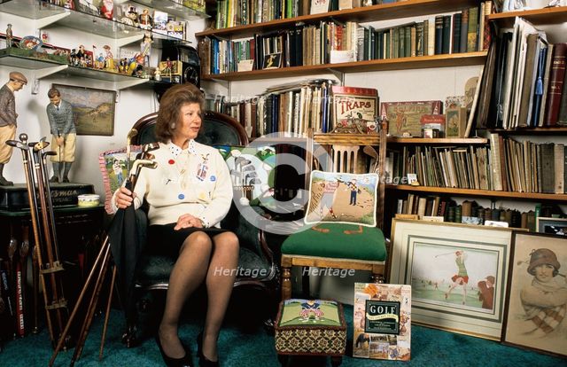 Author Sarah Fabian Baddiel, with some of her collection of golfiana, c2004. Creator: Unknown.