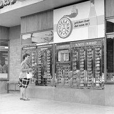 Automatic machine outside a self-service shop, Landskrona, Sweden, 1962