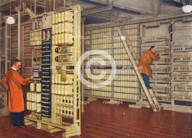 Automatic telephone exchange, 1938. Artist: Unknown.