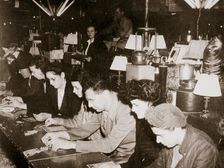 Automobile workers playing bingo at a carnival at Dearborn, Michigan, USA, c1938