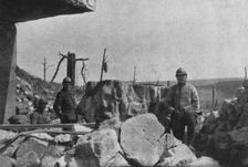Autour de Douaumont; au milieu des blocs de beton redoute eventree, un major et ses..., 1916. Creator: Unknown