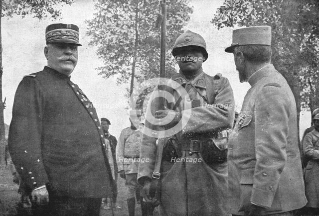'Autour de la Bataille; Le colonial Mathieu Jouy photographie entre le general Joffre..., 1916 (1924 Creator: Unknown.