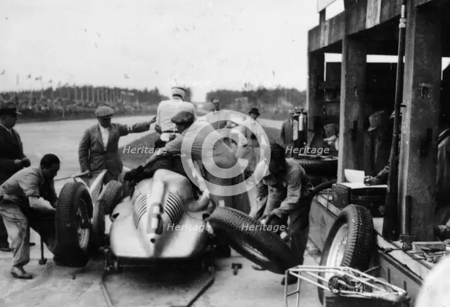 Auto Union in the pits during a Grand Prix, 1938. Artist: Unknown