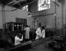 Auto electricians at work at Globe & Simpson, Nottingham, Nottinghamshire, 1961. Creator: Michael Walters
