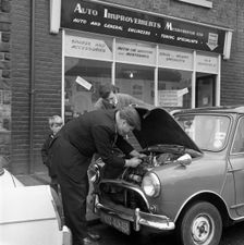 Auto Improvements, Mexborough, South Yorkshire, 1965. Creator: Michael Walters