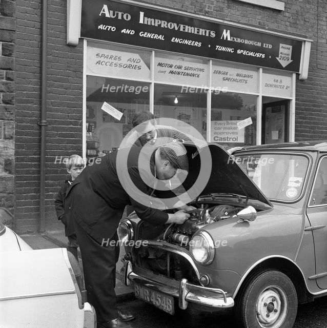 Auto Improvements, Mexborough, South Yorkshire, 1965. Creator: Michael Walters.