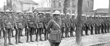 'Aux armees Britanniques; Le nouveau casque anglais 1916 (1924) Creator: Unknown