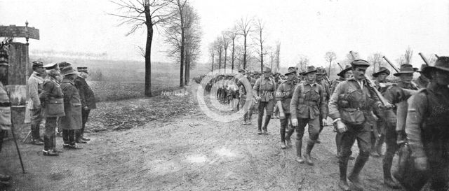 ''Aux armees Britanniques; Un defile de troupes canadiennes devant le general Joffre', 1916 (1924) Creator: Unknown.