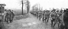 'Aux armees Britanniques; Un defile de troupes canadiennes devant le general Joffre 1916 (1924) Creator: Unknown