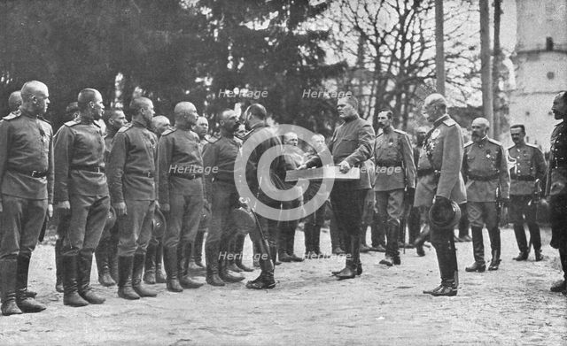 'Aux armees Russes reorganisees; Au quartier imperial: le baiser de paques du Tsar..., 1916 (1924) Creator: Unknown.