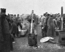 Aux Camps Serbes (Soldats et refugies civils) de Salonique; les cuisines des detchements... 1916. Creator: Hubert Jacques