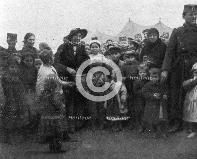 'Aux Camps Serbes (Soldats et refugies civils) de Salonique; Une Belge, elle aussi sans..., 1916. Creator: Hubert Jacques.