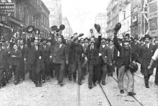 'Aux cris de "Vive la France !", sa voiture est escortee jusqu'a l'Elysee 1914. Creator: Unknown