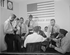 Auxiliary police at a weekly meeting, Washington, D.C., 1942. Creator: Gordon Parks