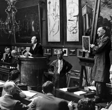 Auction at Sotheby's, London, 1961. Creator: Henry Grant
