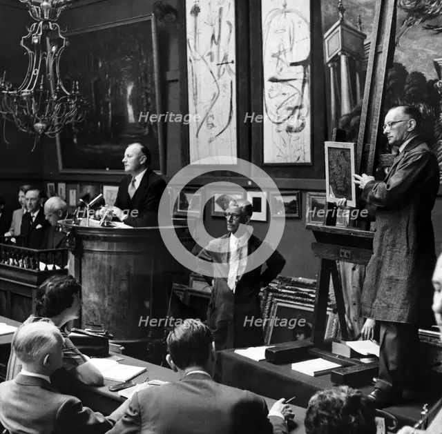 Auction at Sotheby's, London, 1961. Creator: Henry Grant.