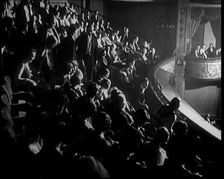 Audience Members taking Their Seats at a Show in London, 1922. Creator: British Pathe Ltd