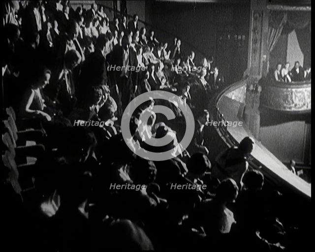 Audience Members taking Their Seats at a Show in London, 1922. Creator: British Pathe Ltd.