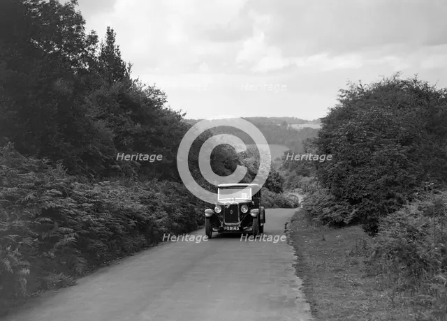 Austin 16/6 taking part in a First Aid Nursing Yeomanry trial or rally, 1931. Artist: Bill Brunell.