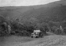 Austin 10 competing in the Mid Surrey AC Barnstaple Trial, Beggars Roost, Devon, 1934. Artist: Bill Brunell