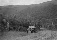 Austin 10 competing in the Mid Surrey AC Barnstaple Trial, Beggars Roost, Devon, 1934. Artist: Bill Brunell